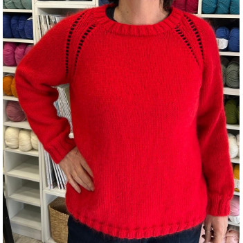 Maglia con buchini kidmohair merino lavorata a mano