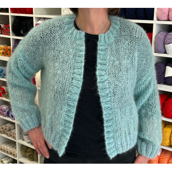 Cardigan Ingenua e bordi laminati lavorato a mano
